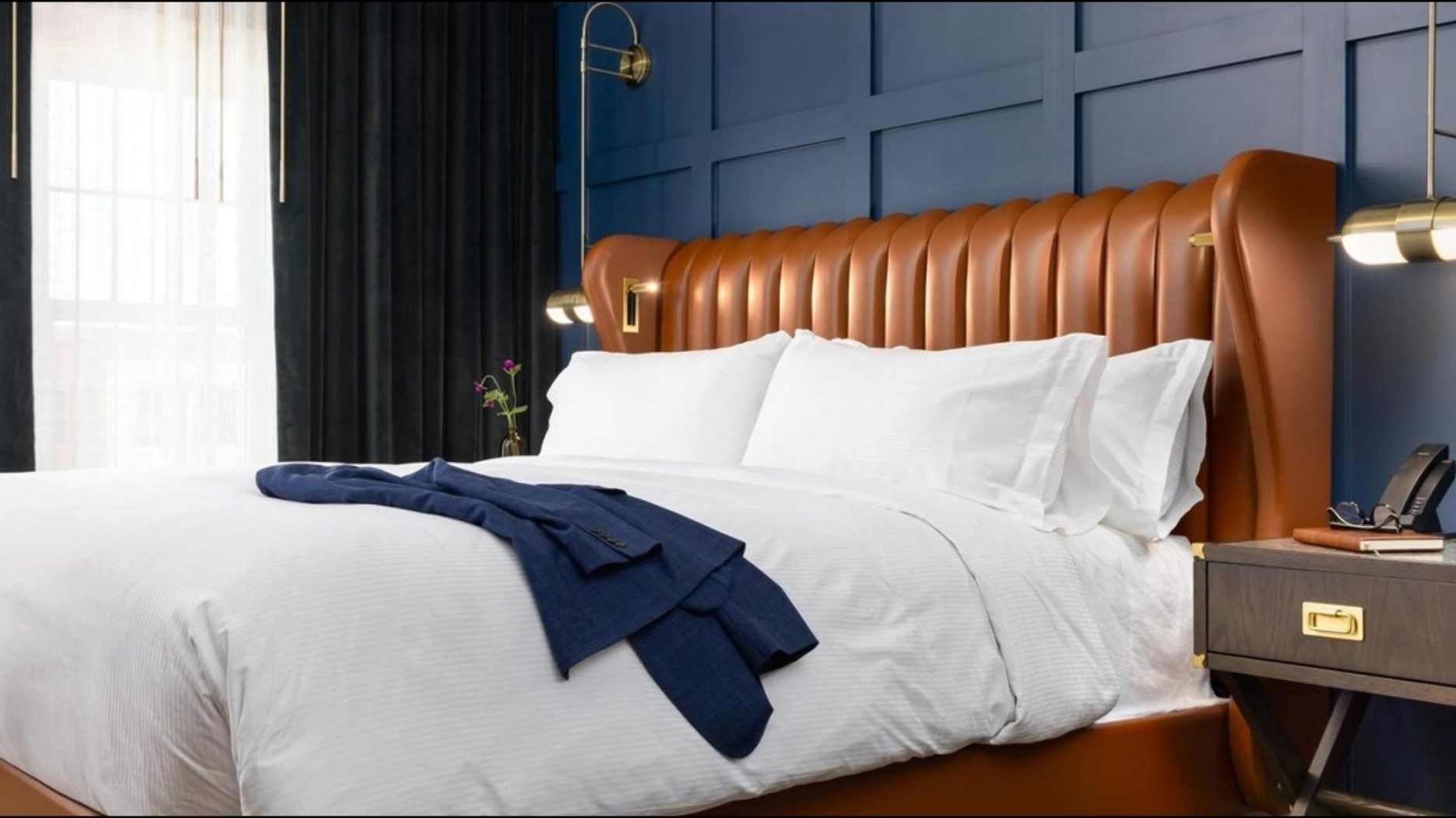 Custom hospitality guestroom furnished through Swain Associates